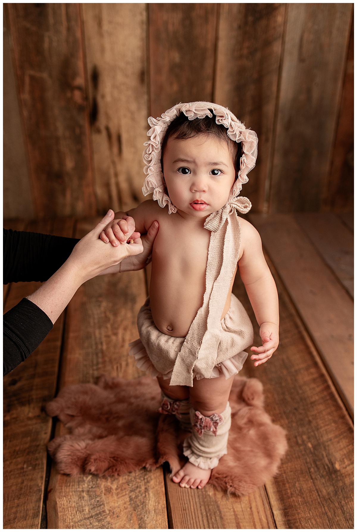 Young baby stands tall for Silver Spring Newborn Photographer