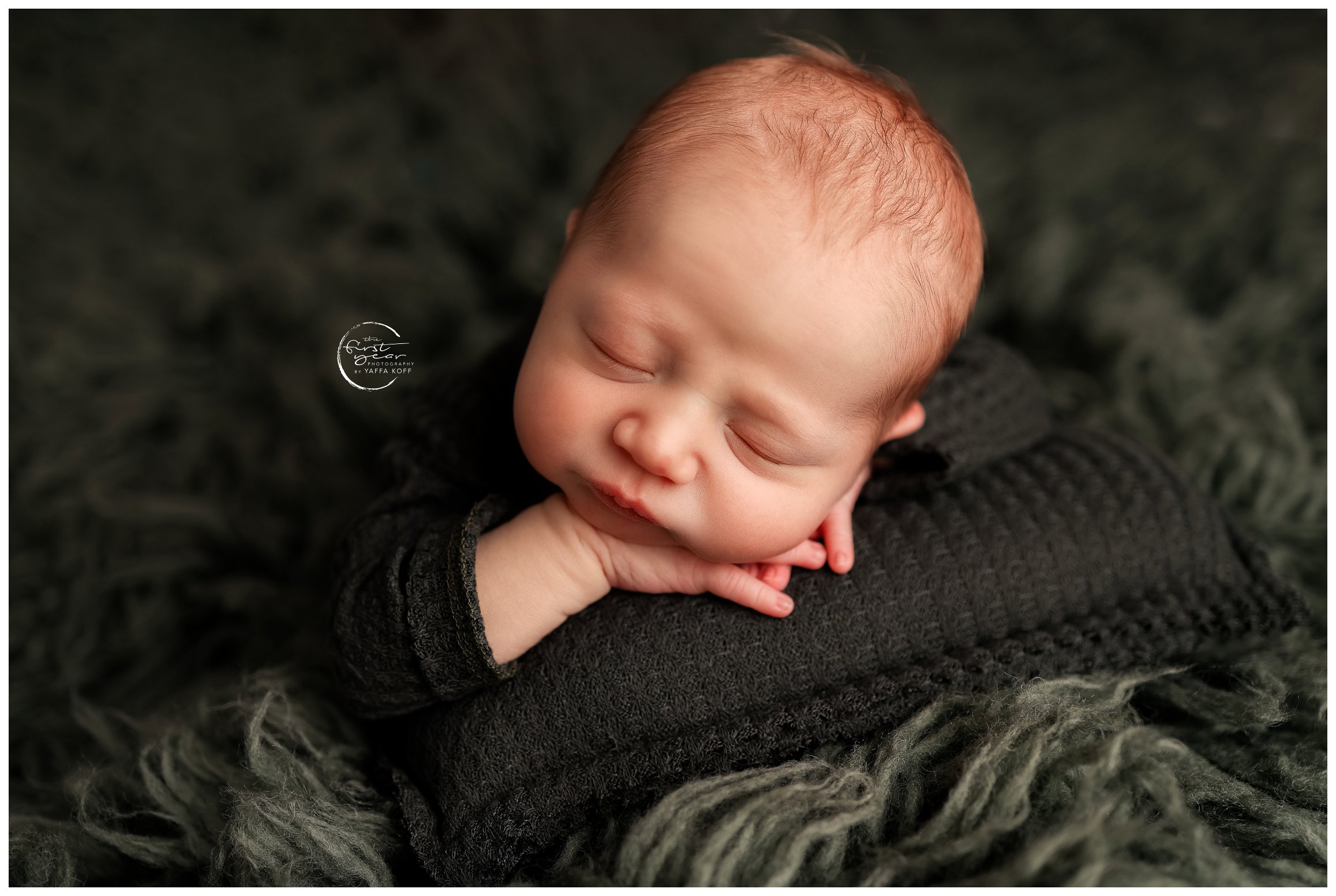 Baby lays on a green blanket for Silver Spring Newborn Photographer